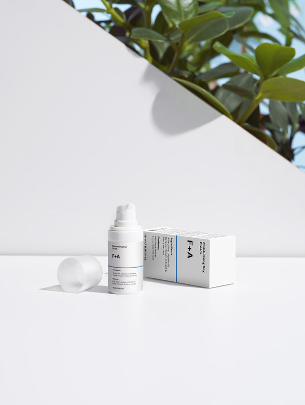 Skincare product with packaging on a white background